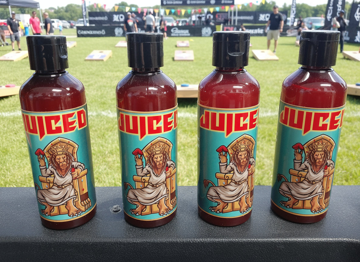 Bottles of 'Juice' with a colorful label featuring a lion and text on a shelf.