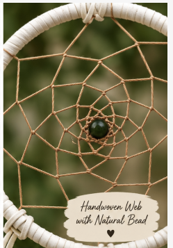 A close-up of a handwoven dreamcatcher with a white wrapped hoop, tan string webbing, and a dark green central bead, set against a blurred green background. A cream-colored label at the bottom reads 'Handwoven Web with Natural Bead'.
