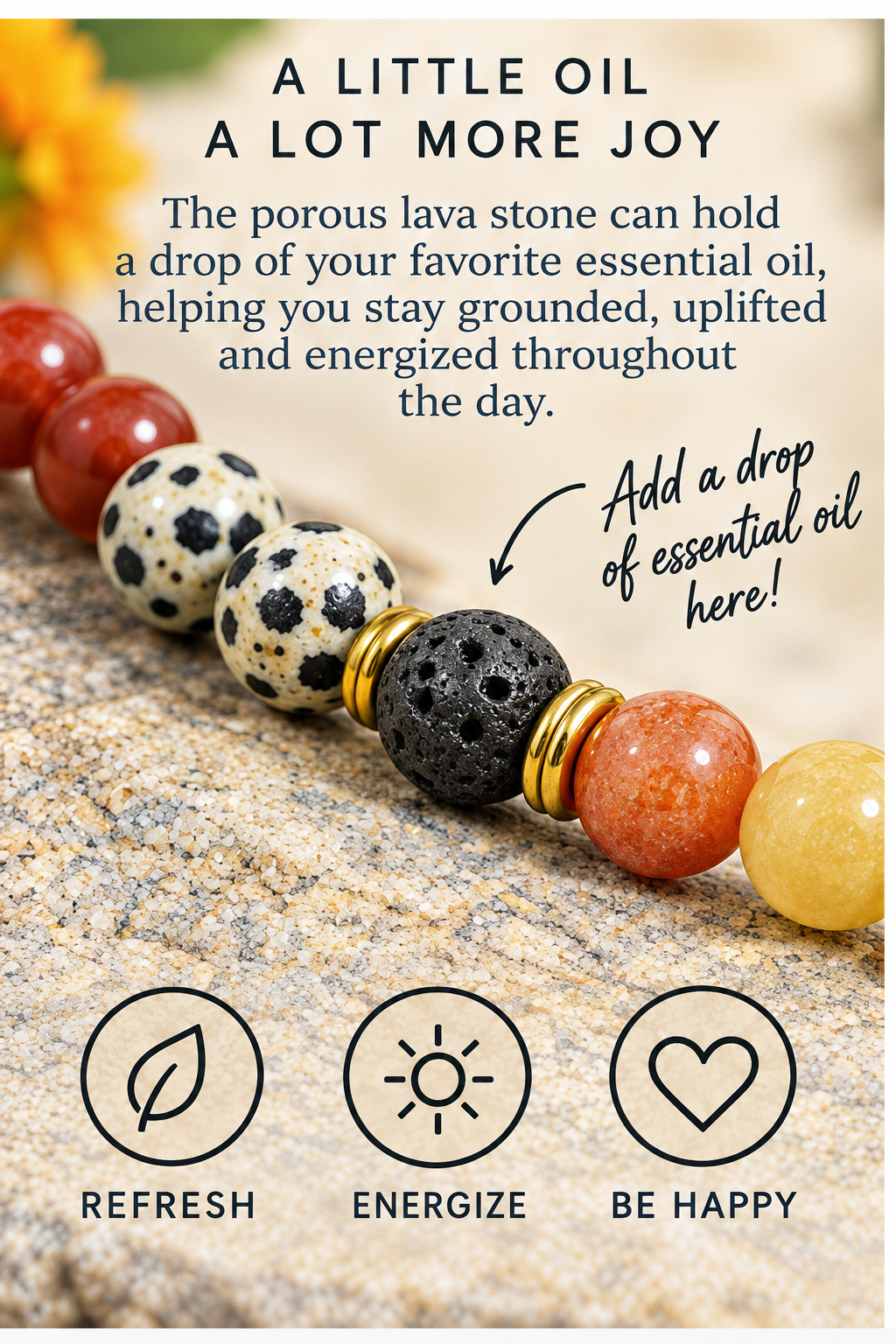 A close-up of a decorative porous lava stone bead holder filled with orange, yellow, and black beads, shown on a textured stone surface with promotional text and icons for refresh, energize, and be happy.
