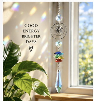 rainbow suncatcher with sun ornament hanging in window good energy brighter days heart