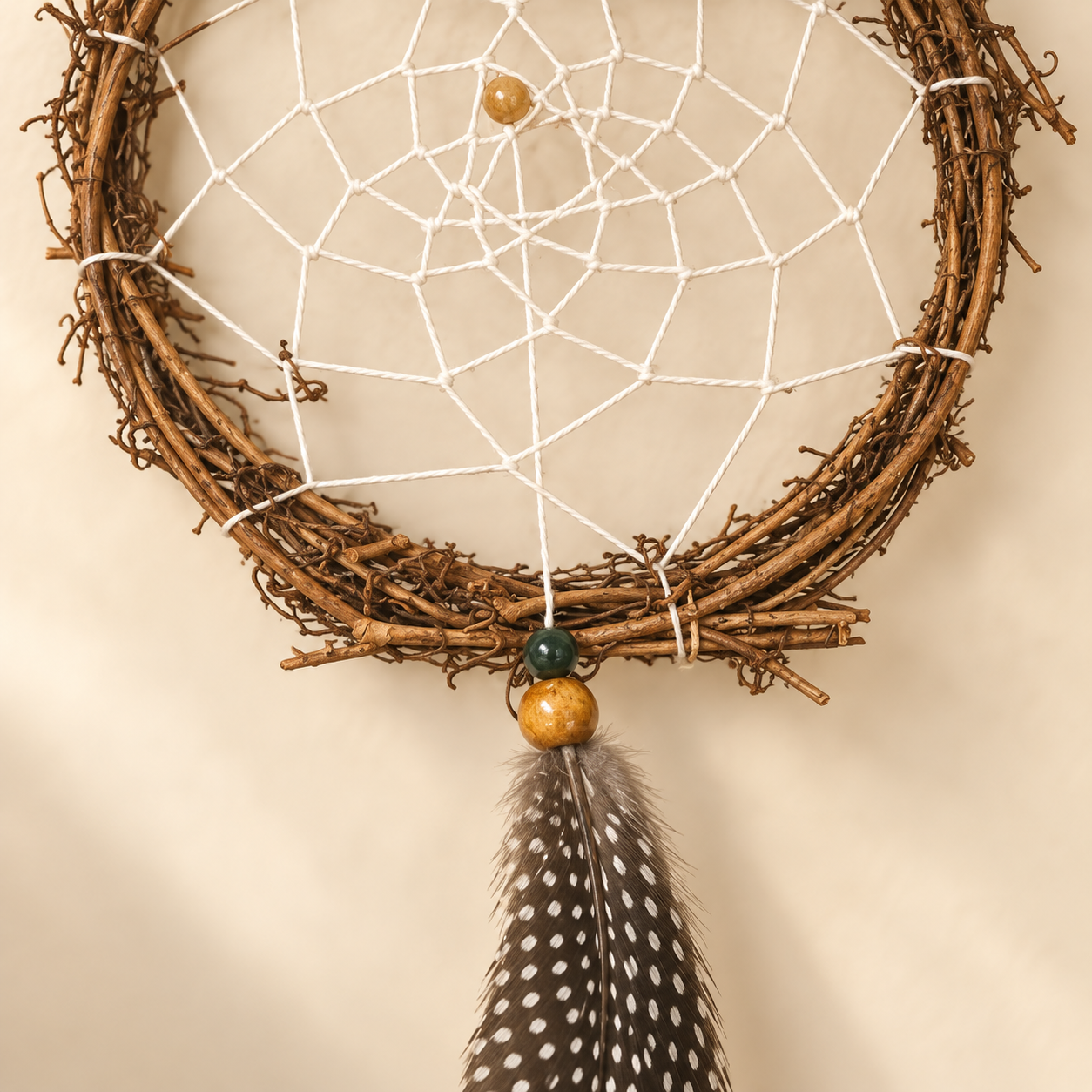 grapevine dreamcatcher with feather closeup