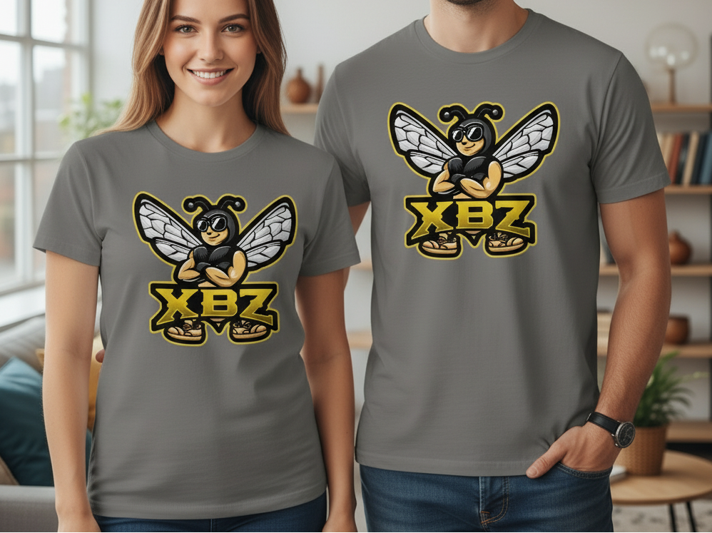Two people wearing gray t-shirts with a bee logo and 'XBZ' text in a room.